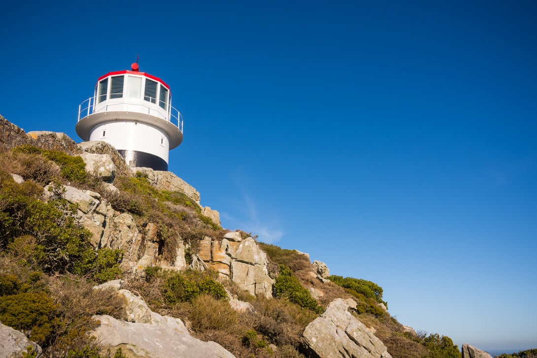 Old lighthouse on the cliffs at Cape Point, South Africa